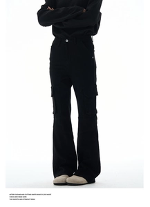 Detail showing the multi-pocket cargo design and flare fit of the black casual pants