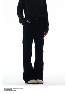 Detail of black multi-pocket cargo pants with reinforced stitching and flared leg style