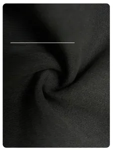 Nahaufnahme der schwarzen Twill-Stoffstruktur mit hochwertigem mattem Finish und feiner Webung