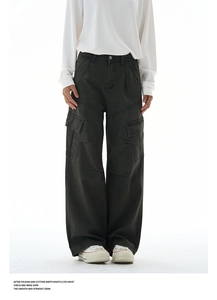 Close-up of cargo side pocket on vintage washed grey wide-leg streetwear trousers