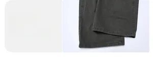 Makroaufnahme der anthrazitgrauen Hose am Beinsaum mit präziser Doppelnaht-Verarbeitung