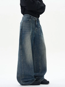 Jean large bleu délavé rétro pour homme avec coutures décoratives et coupe structurée
