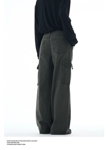 Detail of cargo pants rear side pockets and stitching on heavy cotton twill fabric