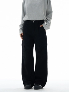 Unisex baggy cargo pants in washed black with large utility pockets and wide leg fit