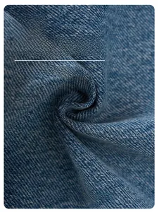 Macro shot of high-quality mid-blue denim fabric texture with soft natural cotton folds