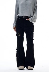 Detailed view of black cargo flared jeans with vintage metal buckle and side pockets