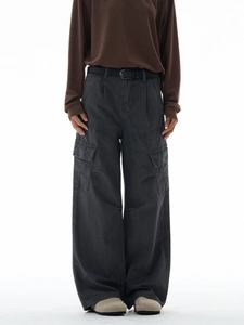 Charcoal grey wide-leg cargo pants with large side pockets and matching waist belt
