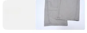 Close-up of double-stitched cuffs on American streetwear grey wide-leg cargo pants