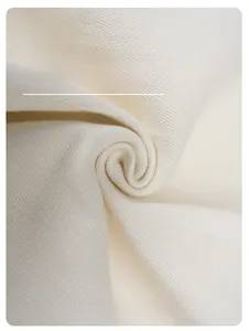 Macro shot of high-quality white twill denim fabric texture for cleanfit trousers