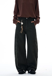 Detail view of American vintage拼接 faded work trousers with wide-leg tailoring and stitching