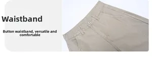 Detail of khakis cotton waistband with button closure and stitching on cargo pants