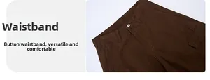 Detailed close-up of dark brown cargo pants waist with metal button and belt loops
