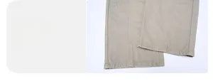 Detail showing the leg opening of khaki work pants with double-stitched reinforced seams