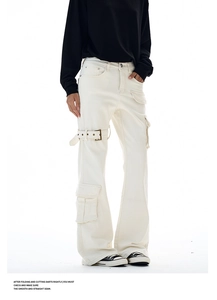 Detail showing off-white cargo pants with 3D pockets and decorative metal buckle straps