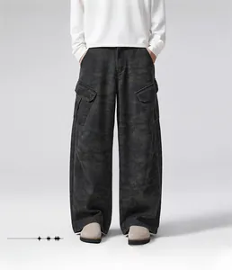 Detail view of olive green camo cargo pants featuring large side flap pockets and loose fit