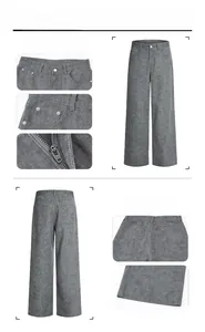 Dettaglio ravvicinato dei pantaloni grigio scuro a trapezio con cuciture e zip metallica
