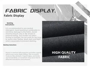 Close-up of high-quality pleated wool trousers fabric with washing and care instructions