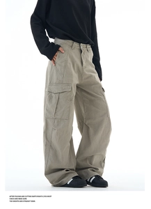 Detailed view of large cargo pockets and premium twill fabric on men's utility pants