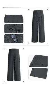 Macro detail of charcoal grey wool trousers showing pleated waist and high-quality fabric texture