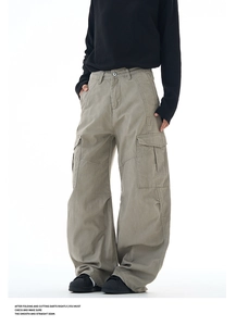 Detail view of multi-pocket cargo pants with durable cotton twill fabric and 3D stitching