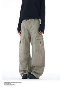 Close-up showing the durable cotton twill fabric and large flap pockets on cargo pants