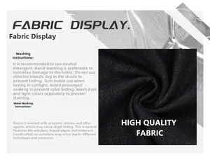 Detail of dark raw denim fabric with washing instructions and fabric care guide