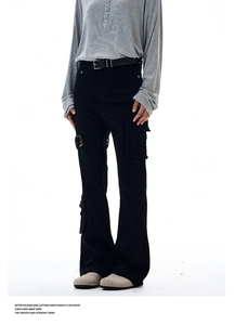 Detail of black cargo flare jeans with utility pockets and metal buckle strap details