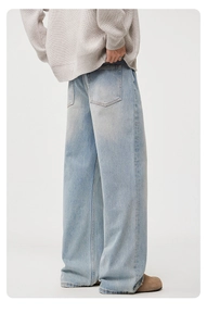 Rear view of light blue wide-leg jeans with relaxed fit and soft washed denim texture
