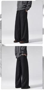 Front and back view of black wide-leg wool trousers featuring a premium draped silhouette