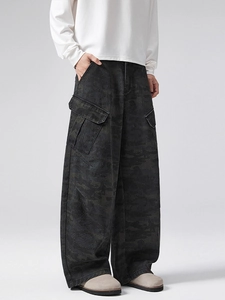 Men's loose dark camouflage cargo pants with utility side pockets and wide leg cut