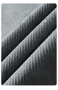 Close-up of dark grey high-quality twill fabric detail for professional men's trousers