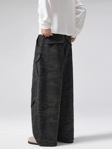 Mens vintage camouflage cargo pants with loose wide leg cut and large side flap pockets