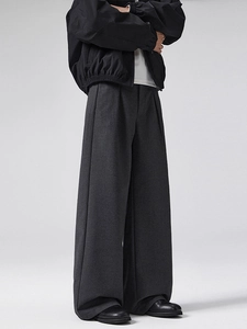 Minimalist wool-blend trousers and jacket set with wide-leg design in dark grey and black