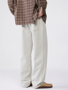 Men's loose white straight leg denim trousers with contrast stitching in retro style
