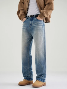 Men's vintage washed blue straight-leg denim jeans with cat-whisker texture in vibe style