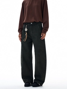 Vintage aesthetic wide-leg cargo pants in faded dark green with metallic waist detailing