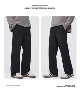 Detail showing the American loose fit and side pocket design of black wide-leg trousers