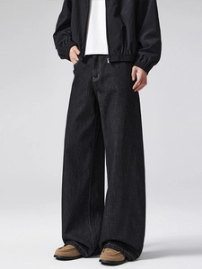 Men's retro black wide leg denim jeans in a relaxed loose fit for a cleanfit street style