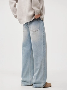 Men's light blue wide-leg jeans with a vintage wash and casual straight-leg fit