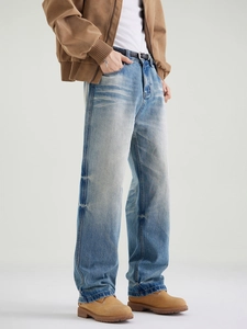 Classic straight-leg blue jeans with vintage whiskering and distressed wash effect
