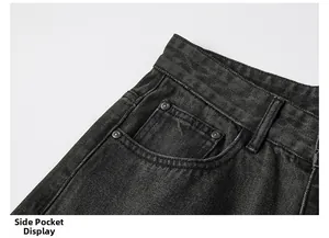 Vue détaillée de la poche latérale d'un jean gris foncé délavé avec rivets en métal