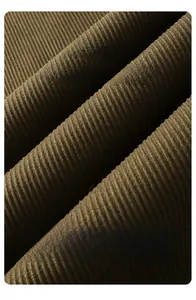 Detailed macro shot of vintage brown corduroy fabric showing durable vertical texture