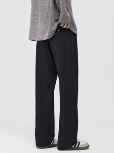 Men's loose straight-leg black suit trousers in a minimalist Japanese casual style