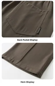 Détail du pantalon marron foncé montrant la poche arrière avec étiquette et l'ourlet