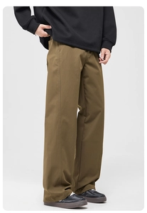 Side view of men's brown loose-fit cargo pants with durable twill cotton fabric details