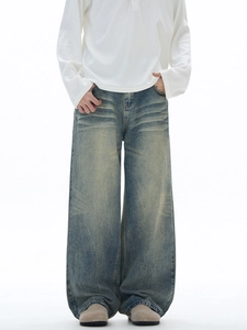 Mens retro washed wide-leg jeans with whiskered patterns and vintage yellow tint finish