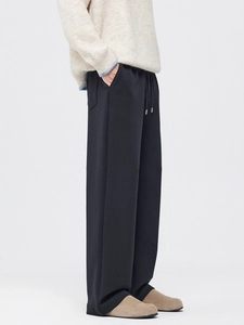 Men's relaxed fit fleece-lined black straight leg trousers with elastic drawstring waist