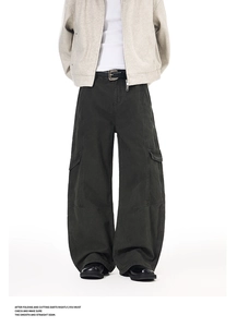 Detailed view of high-street cargo pants with side pockets and contrast stitching