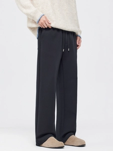 Men's relaxed fit fleece-lined knit trousers with drawstring waist and straight leg design