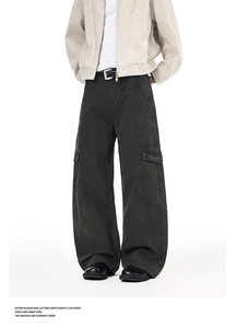 Detail shot of multi-pocket vintage cargo pants in charcoal grey with wide-leg cut